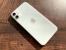 White iPhone 11 on the table